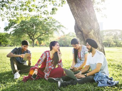 Group of Indian people are using computer laptop